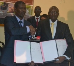 Le ministre et le recteur, après la signature du CDP. Le ministre et le recteur, après la signature du CDP.