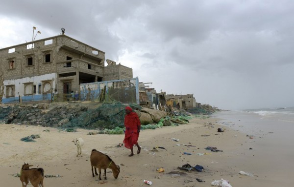 A picture taken on on October 26, 2015, in Saint-Louis du Sénégal shows the remains of houses in the Gokhou Mbathe district that were abandoned because of the approaching sea. Photo: AFP PHOTO / SEYLLOU