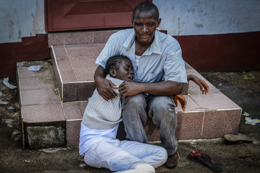 Une famille décimée par le virus Ebola. Monrovia, au Libéria le 10 Octobre, 2014 (Photo: Mohammed Elshamy / Anadolu Agency / Getty Images)