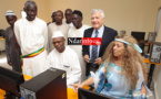 Mme Mme BARROUH, André FROISSARD, Ousmane SOW et Mame DIOP dans la salle informatique équipée ...